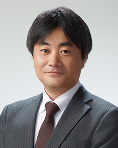 津田 伸介